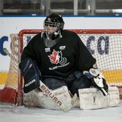 team canada blind hockey goalie in sport mask with otny cage